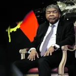 Ilustração ou fotografia do Palácio Presidencial em Luanda ou de João Lourenço em reflexão, simbolizando o dilema da sucessão.